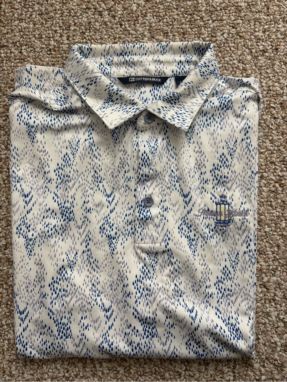 Cutter & Buck White Polo with Blue Abstract Teardrop Pattern